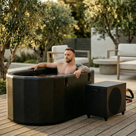 Man relaxing in an outdoor hot tub with a music system next to it
